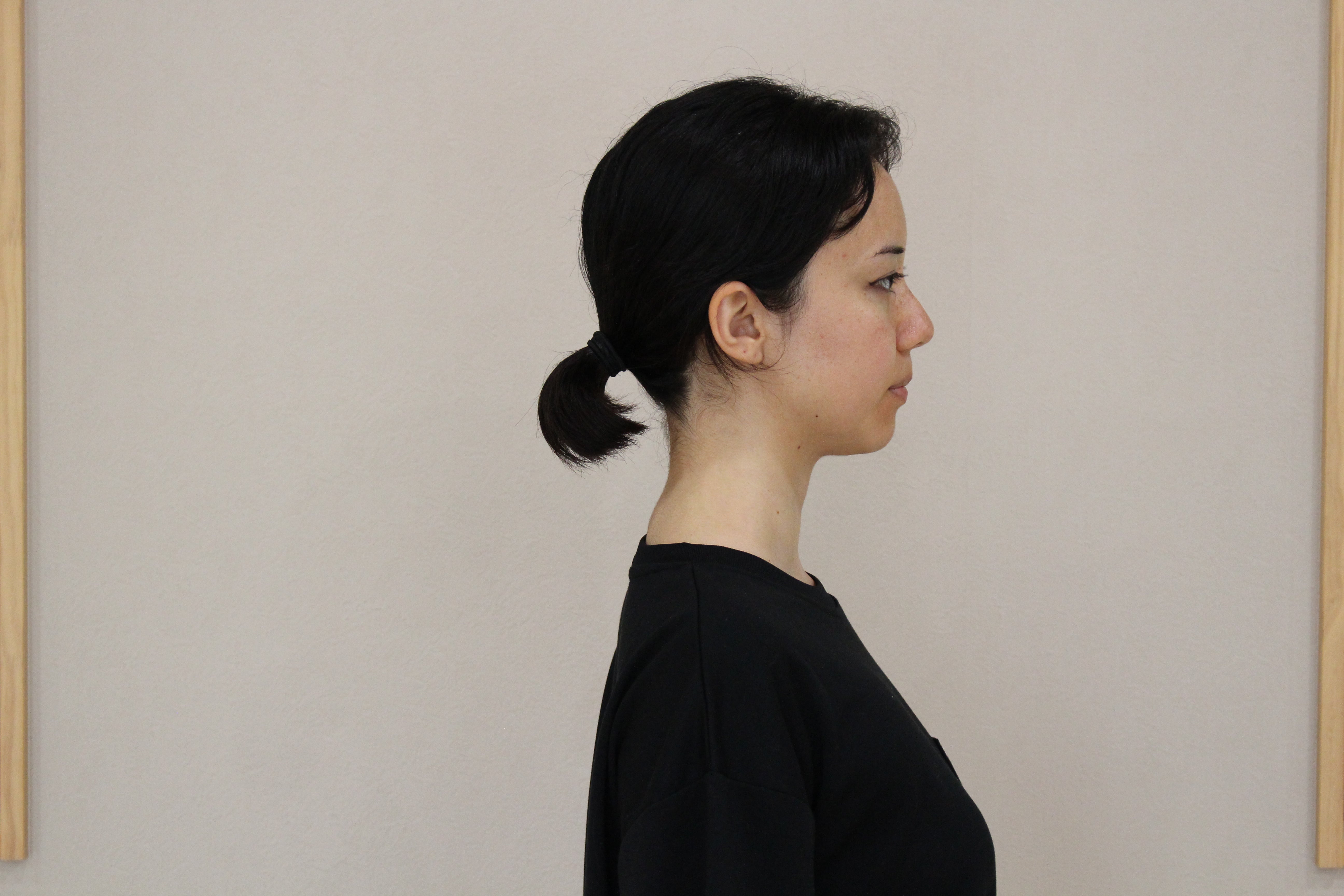A woman demonstrates good posture.